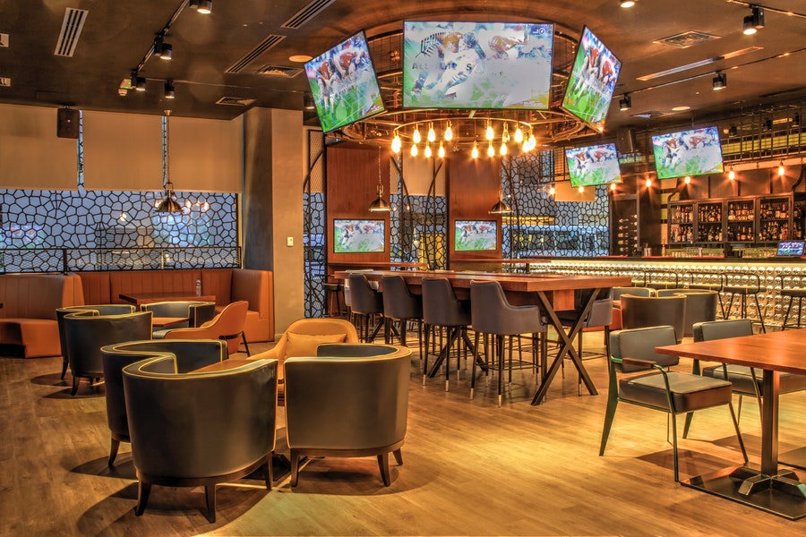 Sports bar with immersive audio video system